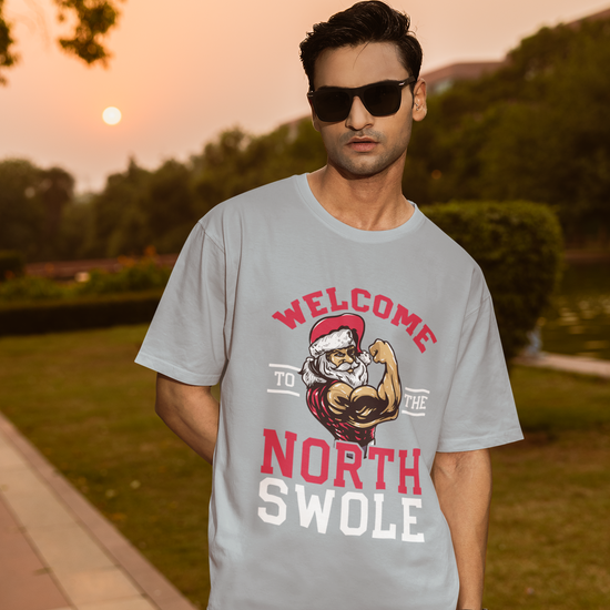 North Swole Santa Graphic Unisex T-Shirt – Oversized 100% Cotton Classic Tee in Grey Melange