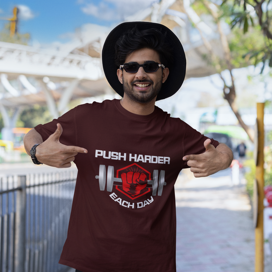 Push Harder Each Day Gym Graphic Unisex T-Shirt – Red Fist and Barbell Design in Maroon