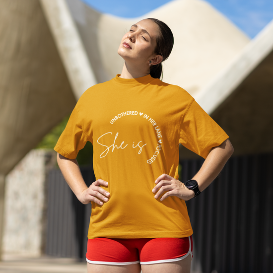 She Is Unbothered and Focused Graphic Unisex Tee | Oversized 100% Cotton Classic T-Shirt in Golden Yellow