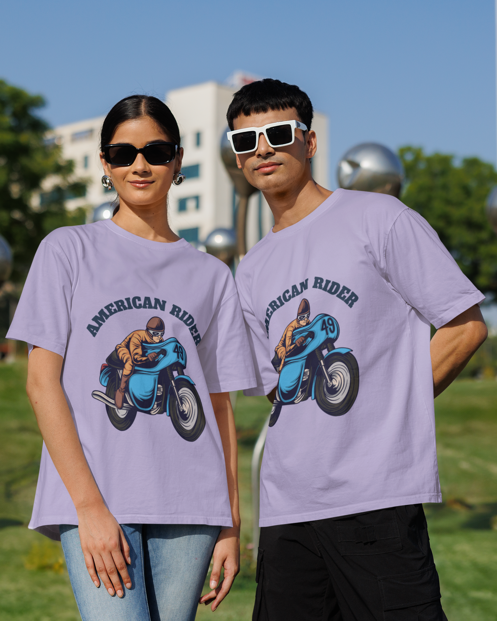 Models wearing lavender oversized unisex t-shirts with "American Rider" graphic – Thodacrazyclub