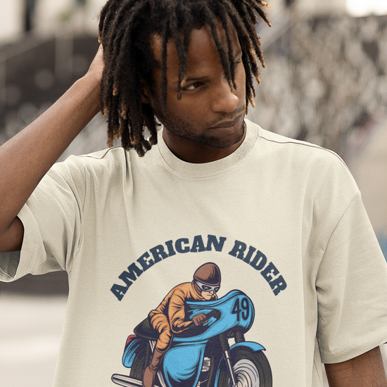 Model wearing off white oversized unisex t-shirt with "American Rider" graphic – Thodacrazyclub