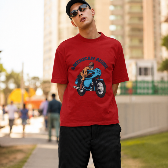 Model wearing red oversized unisex t-shirt with "American Rider" graphic – Thodacrazyclub